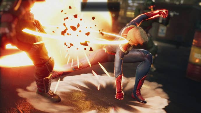 Captain Marvel strikes a pose after biffing a Hydra soldier in Marvel’s Midnight Suns