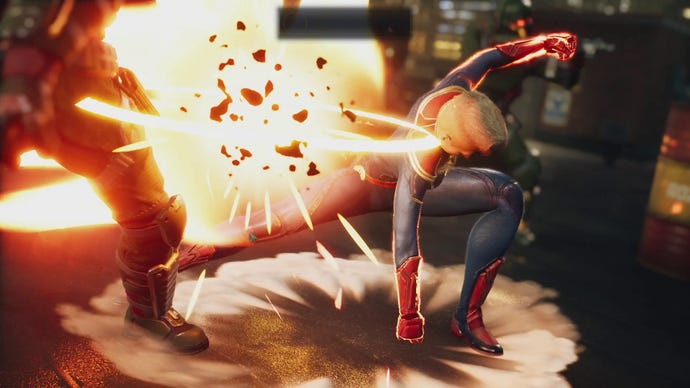 Captain Marvel strikes a pose after biffing a Hydra soldier in Marvel’s Midnight Suns