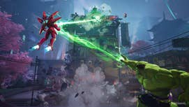 Marvel Rivals screenshot showing The Hulk and Iron Man performaning a team attack and hitting a building.