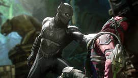 Black Panther is holdin a enemy NPC up in his hand up in some kind of temple-like area up in Marvel's Avengers.