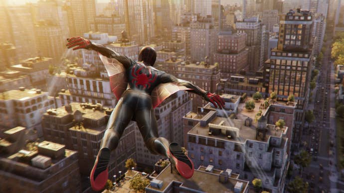 Miles Morales uses his web-wings to keep him aloft about New York City, which is blazing with evening sunlight, in this shot from Spider-Man 2