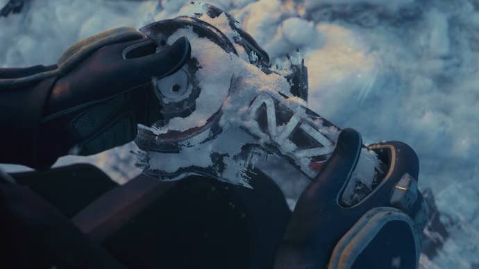 Liara picks up a piece of N7 armour from the snow in the Mass Effect 5 teaser trailer.