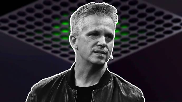 Matt Booty in front of an Xbox.