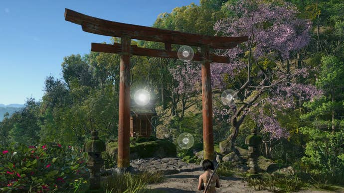 A torii gate in Assassin’s Creed Shadows, and four inputs on the screen indicating that a meditation mini-game is underway.