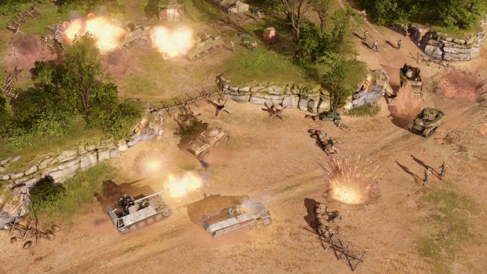 Tanks fire in a flank attack in Men Of War 2