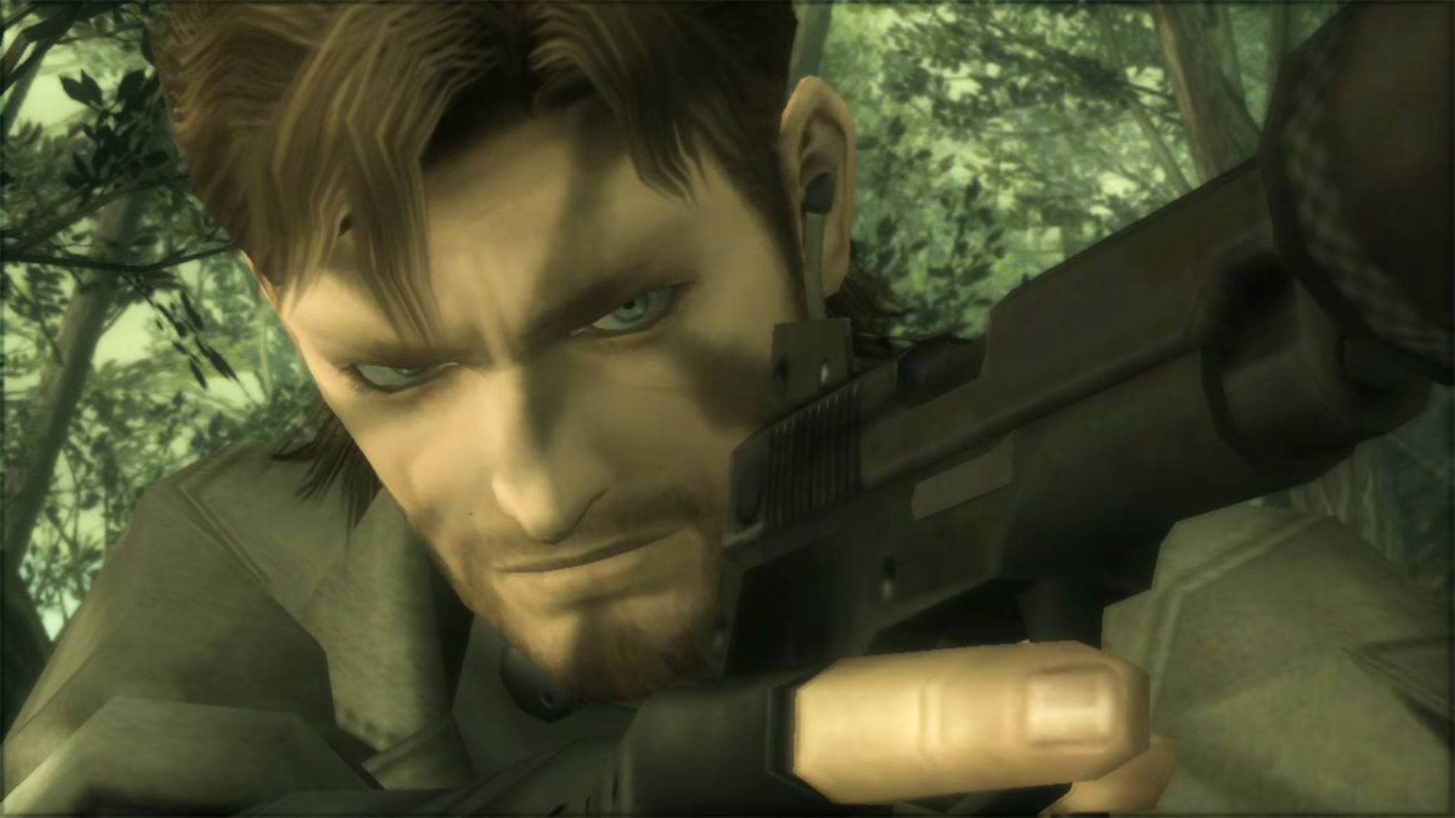 A close-up of Snake in Metal Gear Solid 3: he is in the forest, and has camoflage paint on his face. - 1