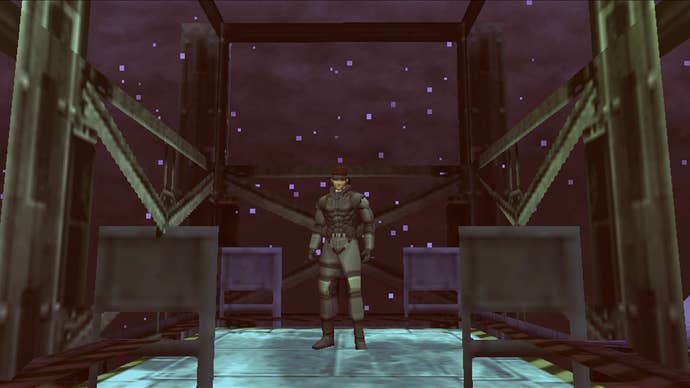Solid Snake stands in an elevator in Metal Gear Solid