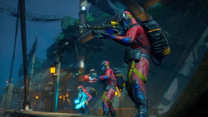 Ghost busters aim their ghost busting guns in Midnight Ghost Hunt