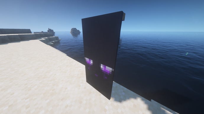 An Enderman eyes Banner in Minecraft, placed in the ground by the coast.