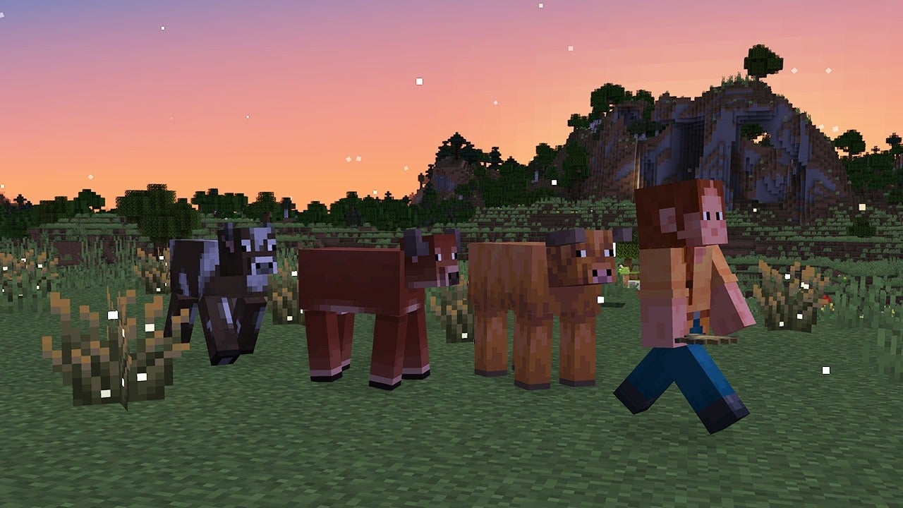 A player followed by three types of cow in Minecraft's latest update, which adds two cow variants. - 7