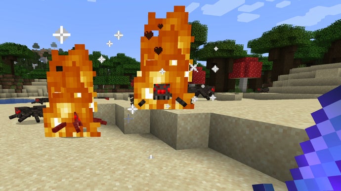 Minecraft oyuncusu, Dragon Enchants moduyla eklenen büyülerden birini kullanarak bazı örümcekleri yok ediyor.