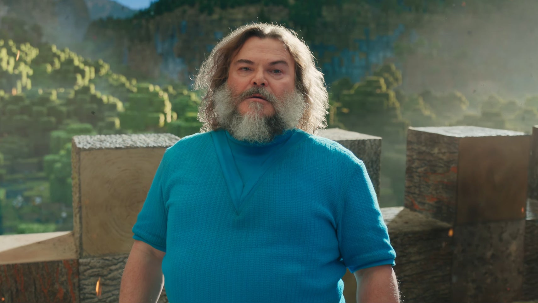Jack Black wearing a blue t-shirt as Stever in the Minecraft movie. - 1