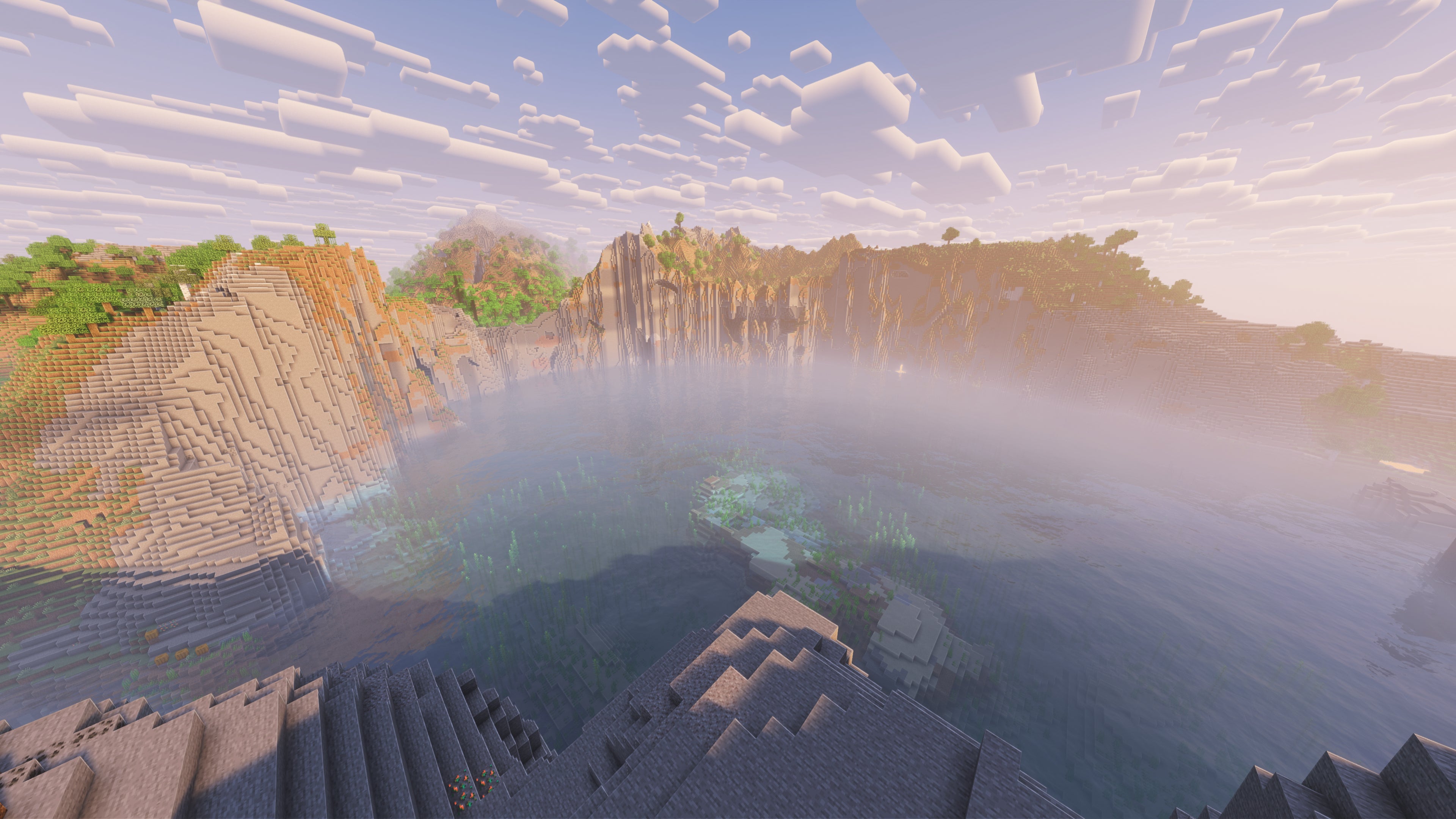 A landscape screenshot of a Minecraft seed, showing a lake inside a massive crater surrounded by hills. - 30
