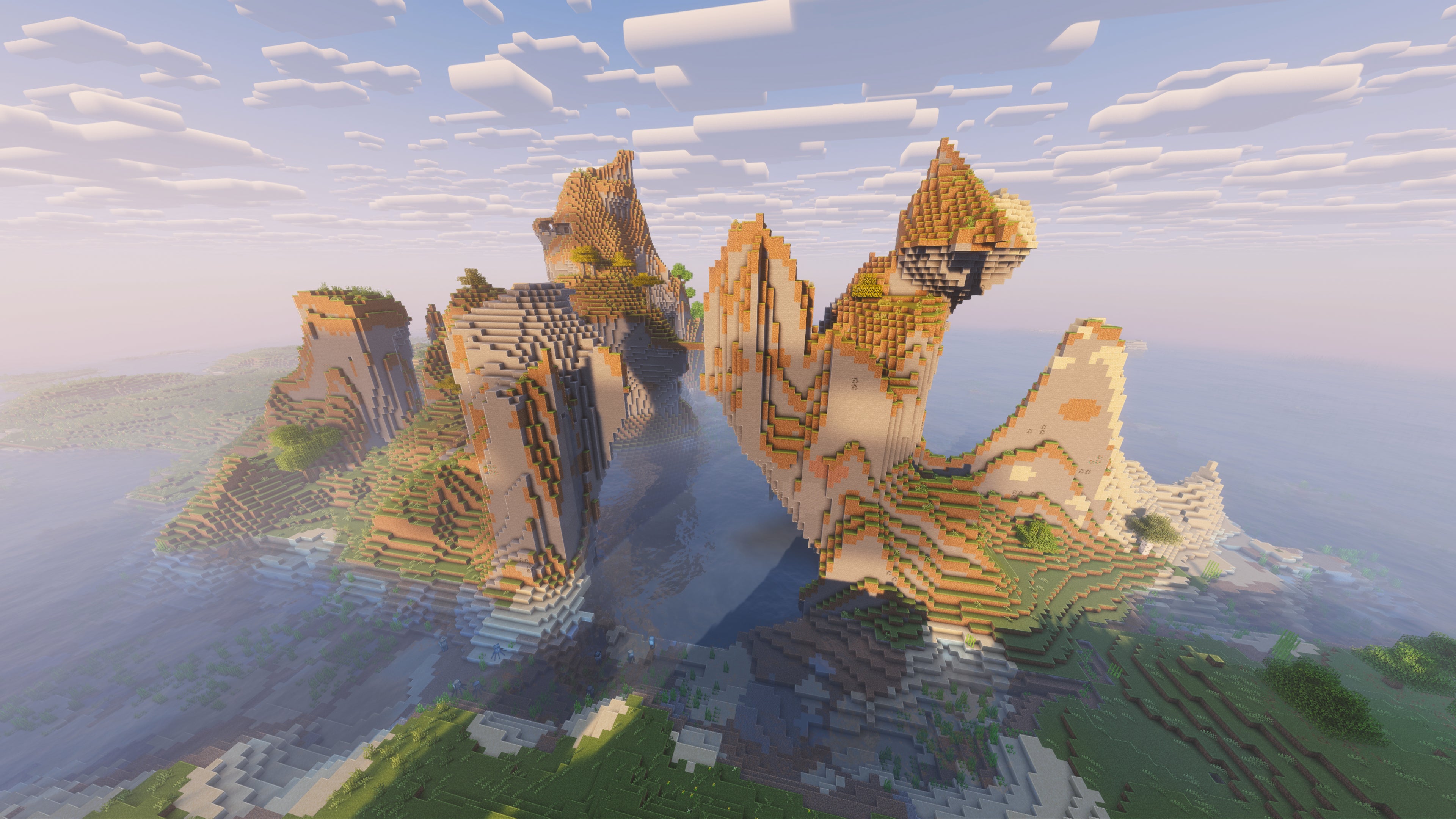 A landscape screenshot of a Minecraft seed, showing some interesting rock formations on the edge of the sea. - 39
