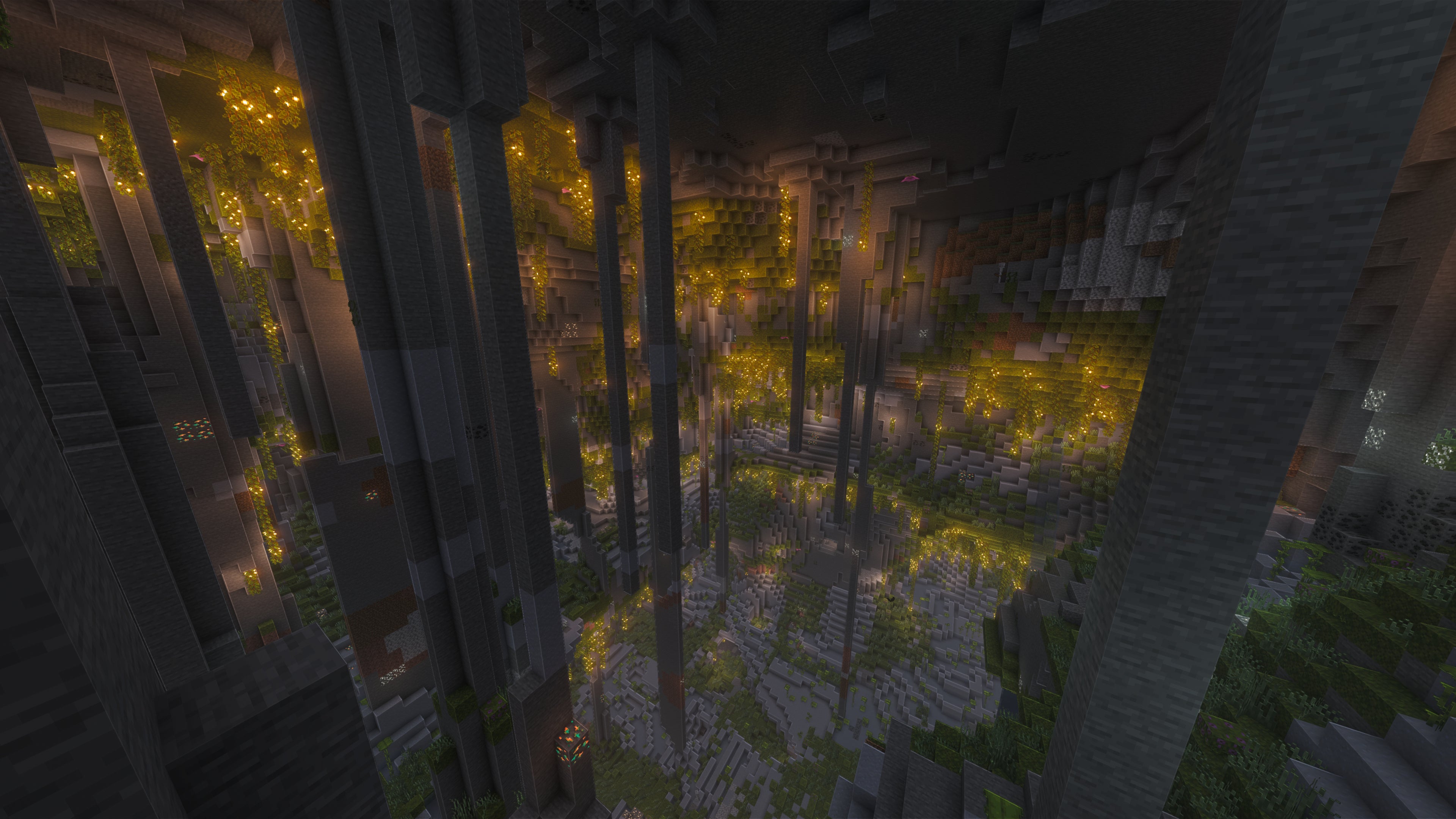 A landscape screenshot of a Minecraft seed, showing the spectacular Lush Caves interior of a hollowed-out mountain. - 3