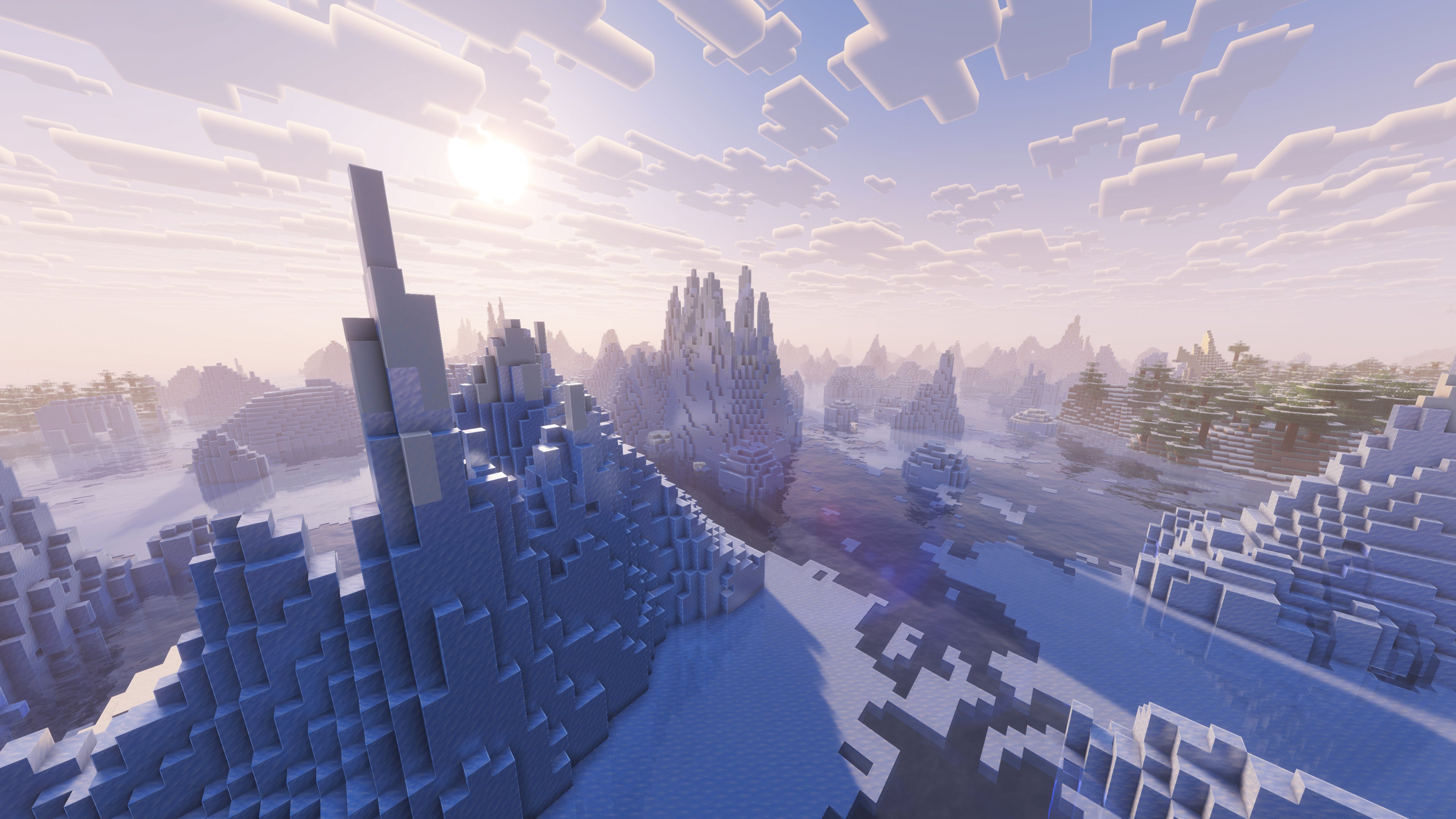 A landscape screenshot of a Minecraft seed, showing a large Ice Spikes biome on the edge of a snowy Taiga Forest. - 19