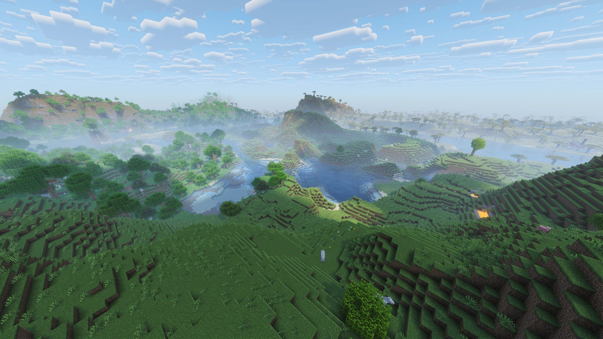 A landscape screenshot of a Minecraft seed, showing a beautiful plains biome with lakes and rivers at the base of a hill. - 11