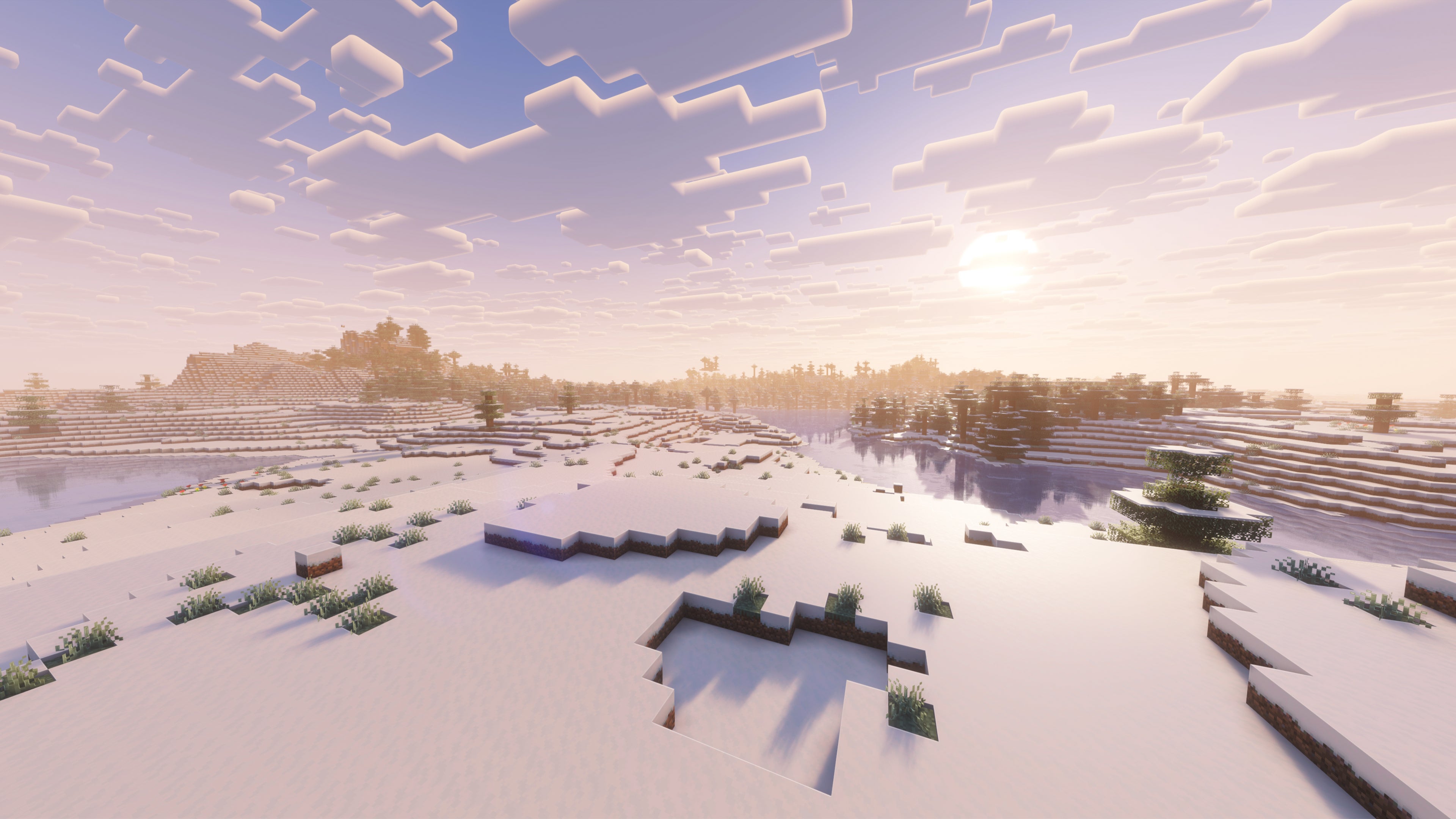 A landscape screenshot of a Minecraft seed, showing a lovely snowy biome with an ice river running through the terrain. - 37