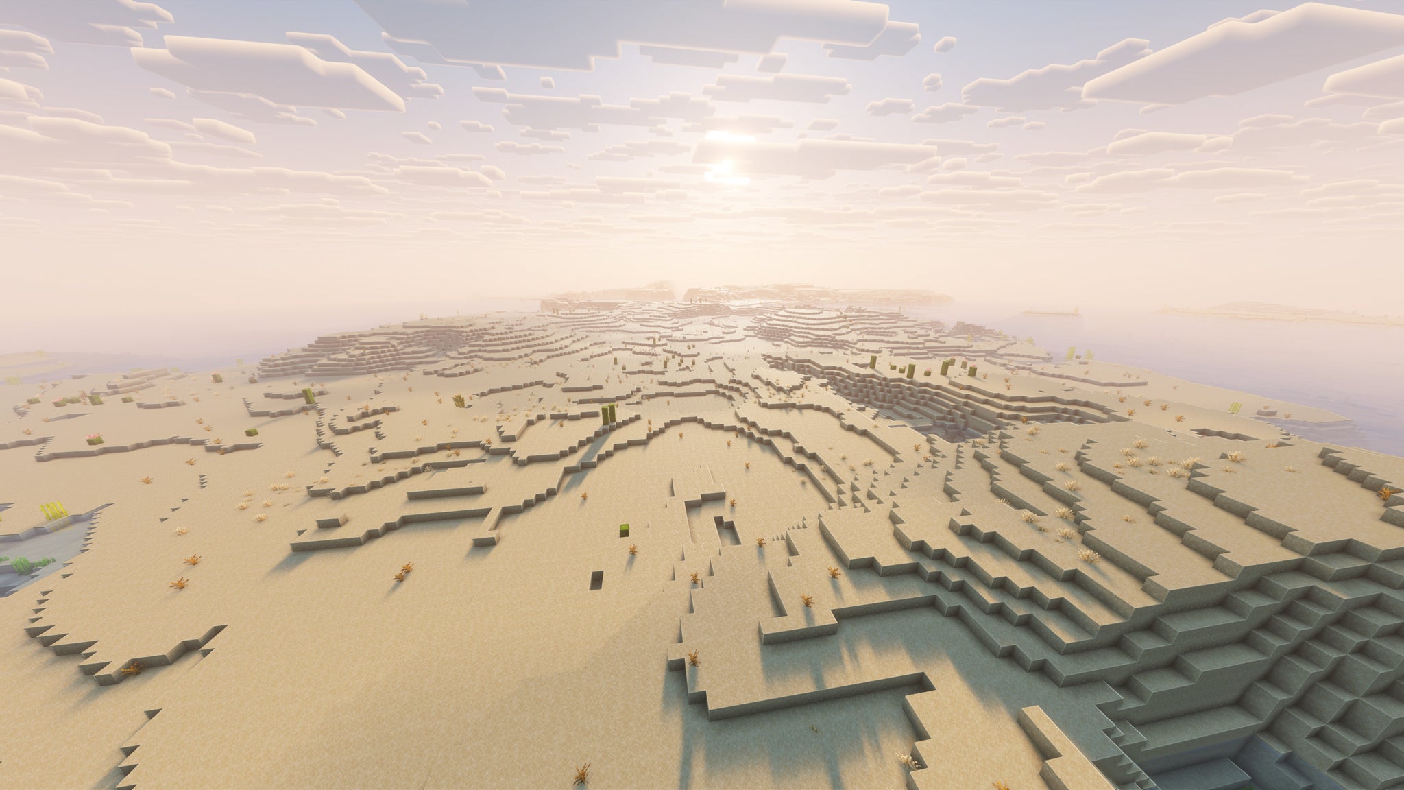A landscape screenshot of a Minecraft seed, showing a treeless Desert biome as far as the eye can see. - 9