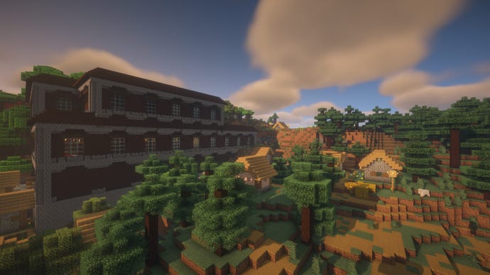 Minecraft screenshot of the ‘sunken mansion’ seed showing a Woodlands Mansion surrounded by a forest and village.