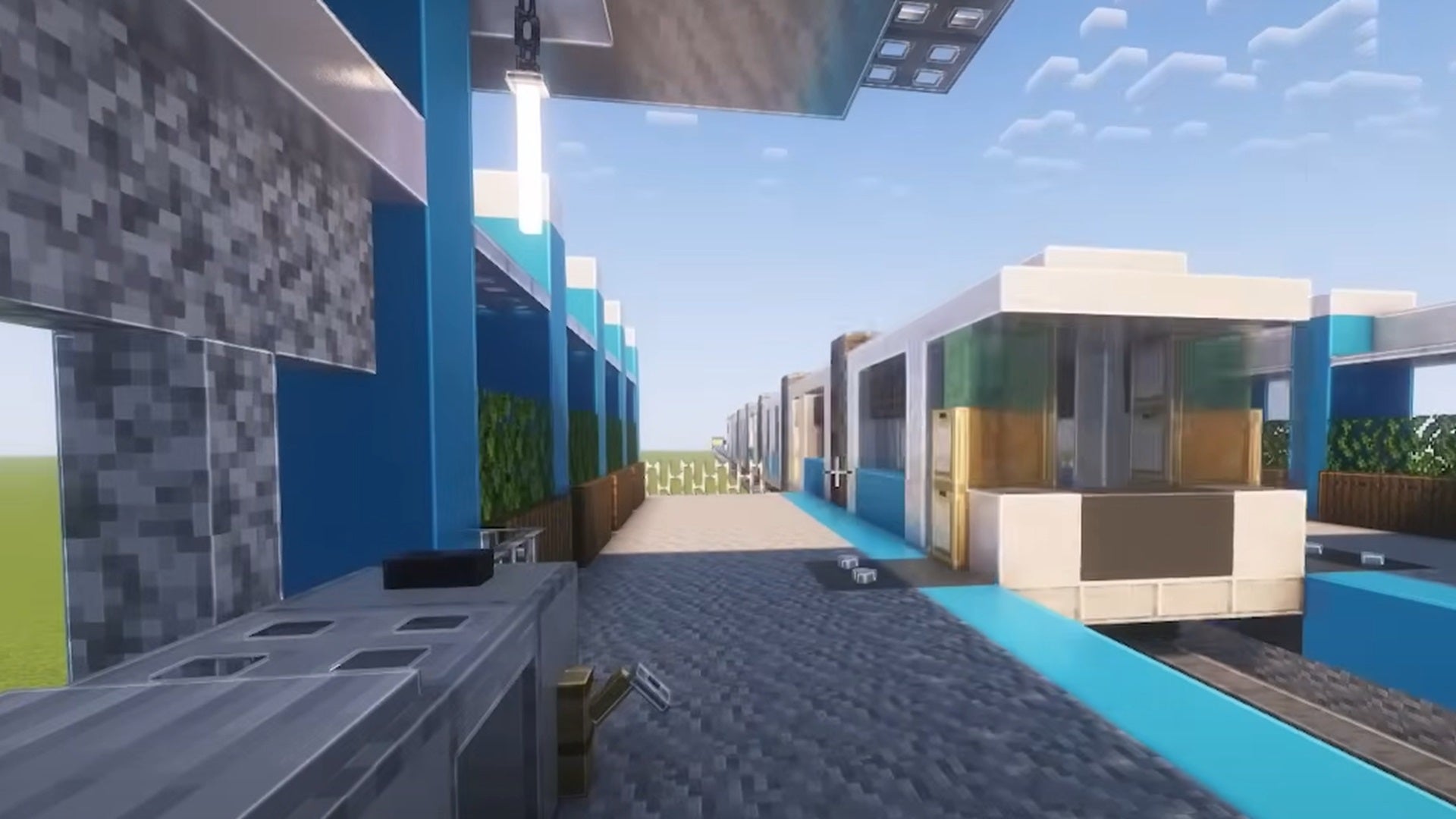 A train pulls into a station in Minecraft - both created by YouTuber Jmox. - 39