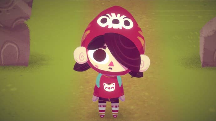 A young girl looks up curiously in Mineko’s Night Market