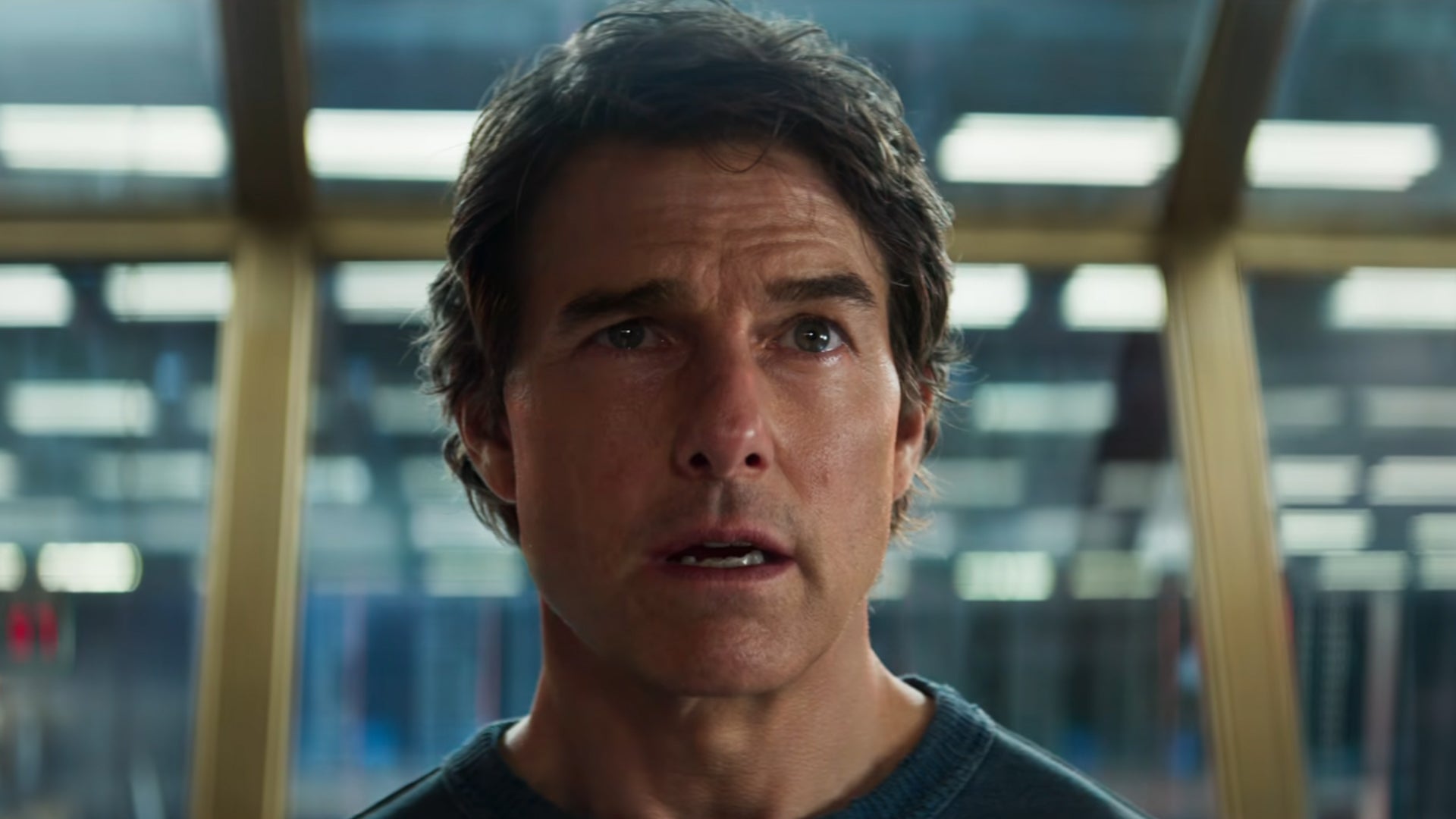 Tom Cruise in Mission: Impossible - The Final Reckoning, he has a serious expression on his face.