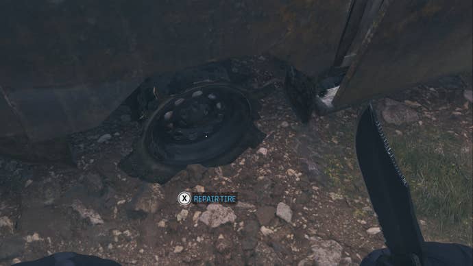 modern warfare 3 zombies knife beside damaged tire with repair tire prompt