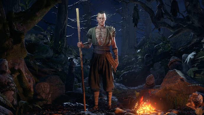 The Monk stands by a fire in the Path of Exile 2 character select screen.