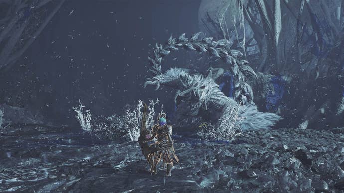 monster hunter wilds arkveld lifting arm up