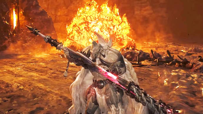 A hunter clad in white in Monster Hunter Wilds sheathes their glowing sword in a lava hellscape, with a flaming monster behind them.