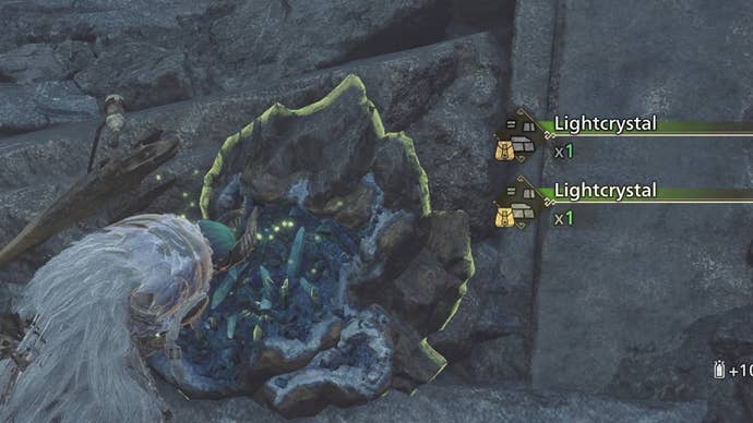 monster hunter wilds hunter collecting light crystal mining outcrop