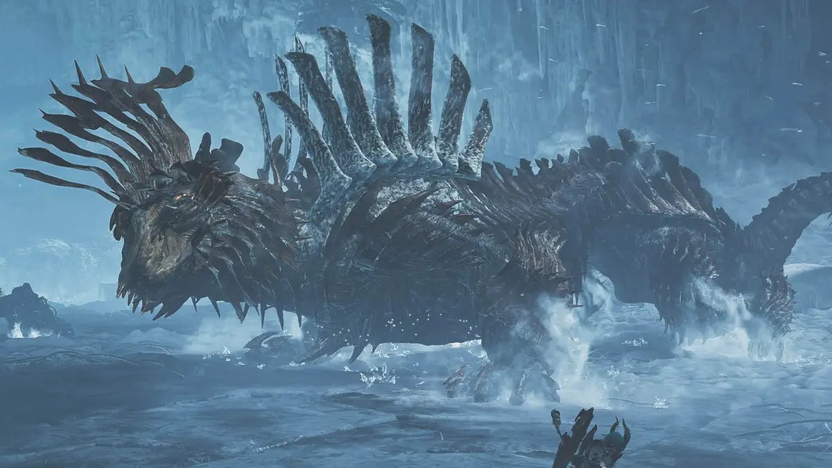 A big ice-based monster, Jin Dahaad, formed of ridges and metal-like armor, in an ice level in Monster Hunter Wilds. - 3