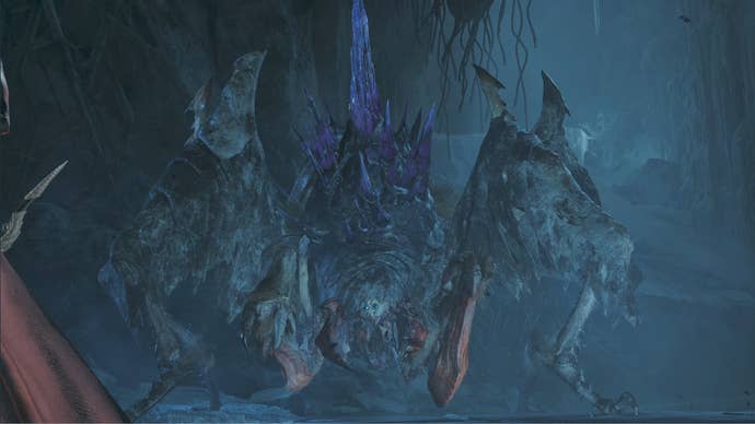 A Nerscylla, a large monster in Monster Hunter Wilds, faces off against the player.