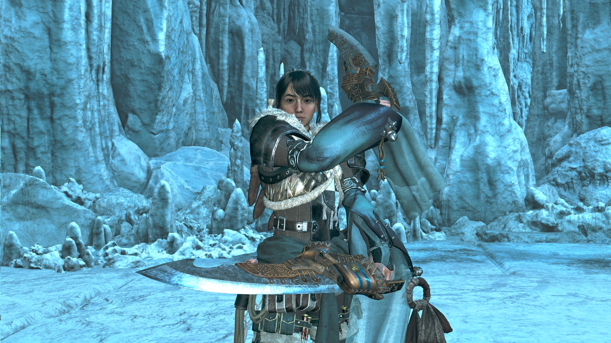A female hunter in Monster Hunter Wilds poses in front of the camera with their weapon of choice, the Dual Blades. - 1