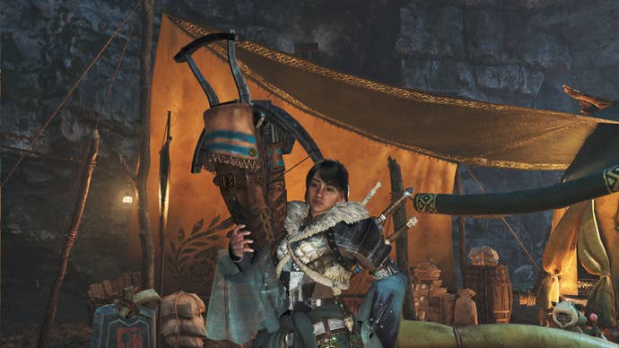 A female hunter in Monster Hunter Wilds poses in front of the camera with their weapon of choice, the Light Bowgun.