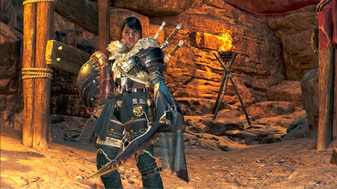 A female hunter in Monster Hunter Wilds poses in front of the camera with their weapon of choice, the Sword And Shield.