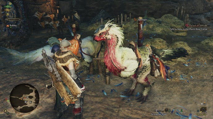 The player examines their mount, a velociraptor-like beast called a Seikret.