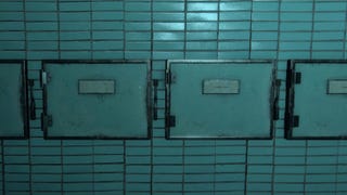 A row of cold storage morgue vaults.