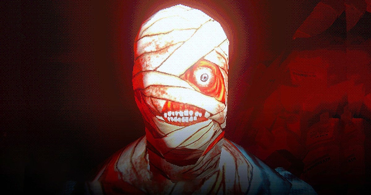 A bandaged zombie-like creature with one big eye and very red flesh and a menacing set of teeth, stares at the camera.
