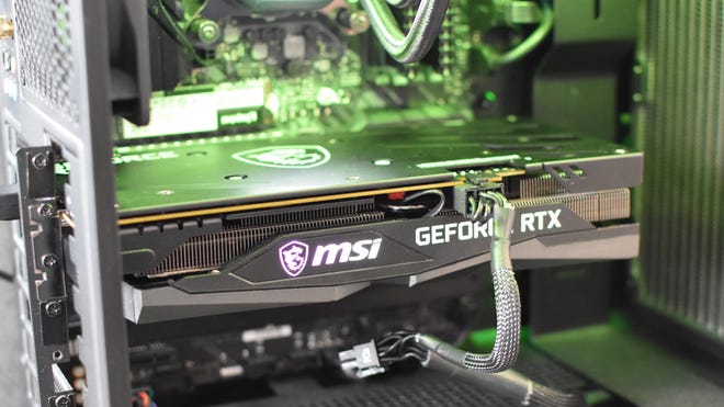 The MSI GeForce RTX 3050 Gaming X 8G installed and running inside a PC.