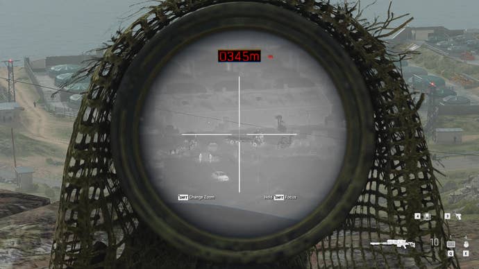 A screenshot from Modern Warfare 2 (2022) which shows the player in a ghillie suit, viewing an enemy facility through a thermal scope.
