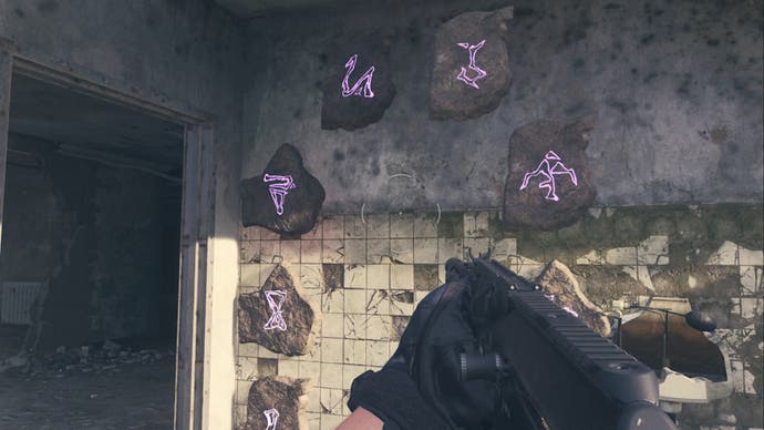 MW3 Zombies Orlov Military base portal on wall of a half destroyed room.