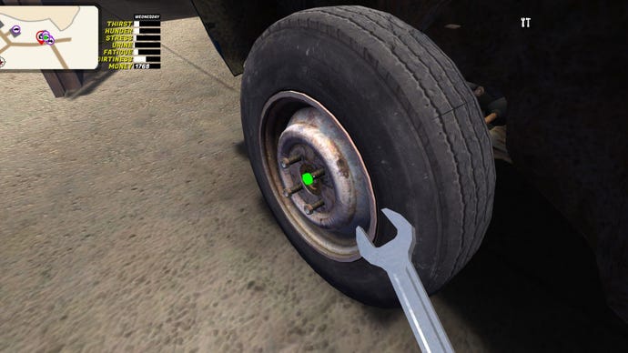The player fixes a tire with a wrench.