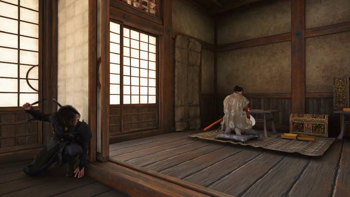 Naoe kneels and is about to take out a target in a castle in Assassin’s Creed Shadows.