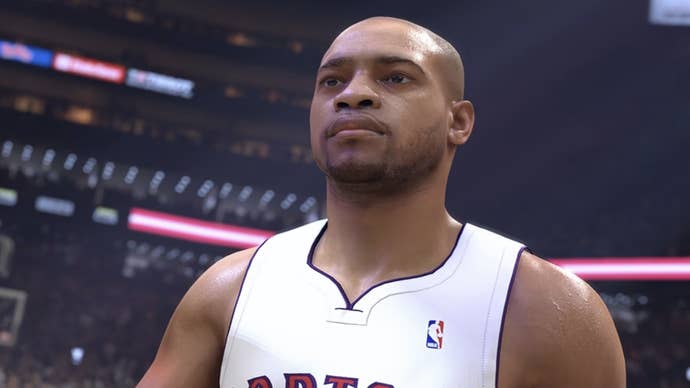 An NBA 2K25 player standing in the middle of the court looking up at the net