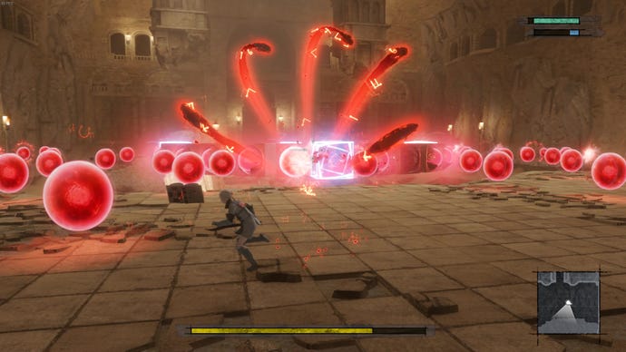 I dodge red balls that spew from a huge boss made of cubes.