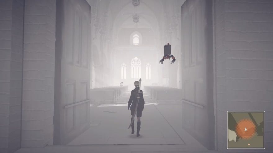A2 steps into a mysterious church building in what appears to be Nier: Atomata’s Copied City
