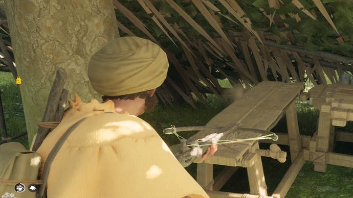 A player stands in front of a workbench while crafting Nightingale slingbow ammo