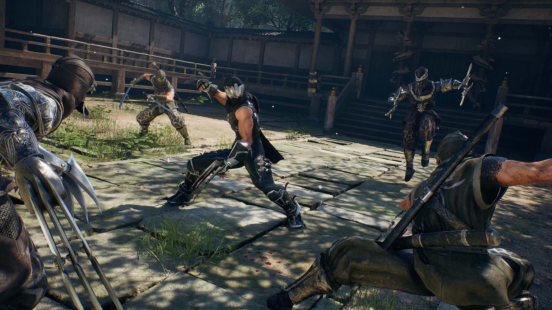 Ryu Hayabusa fights off a legion of foes surrounding him in Ninja Gaiden 2 Black. - 1